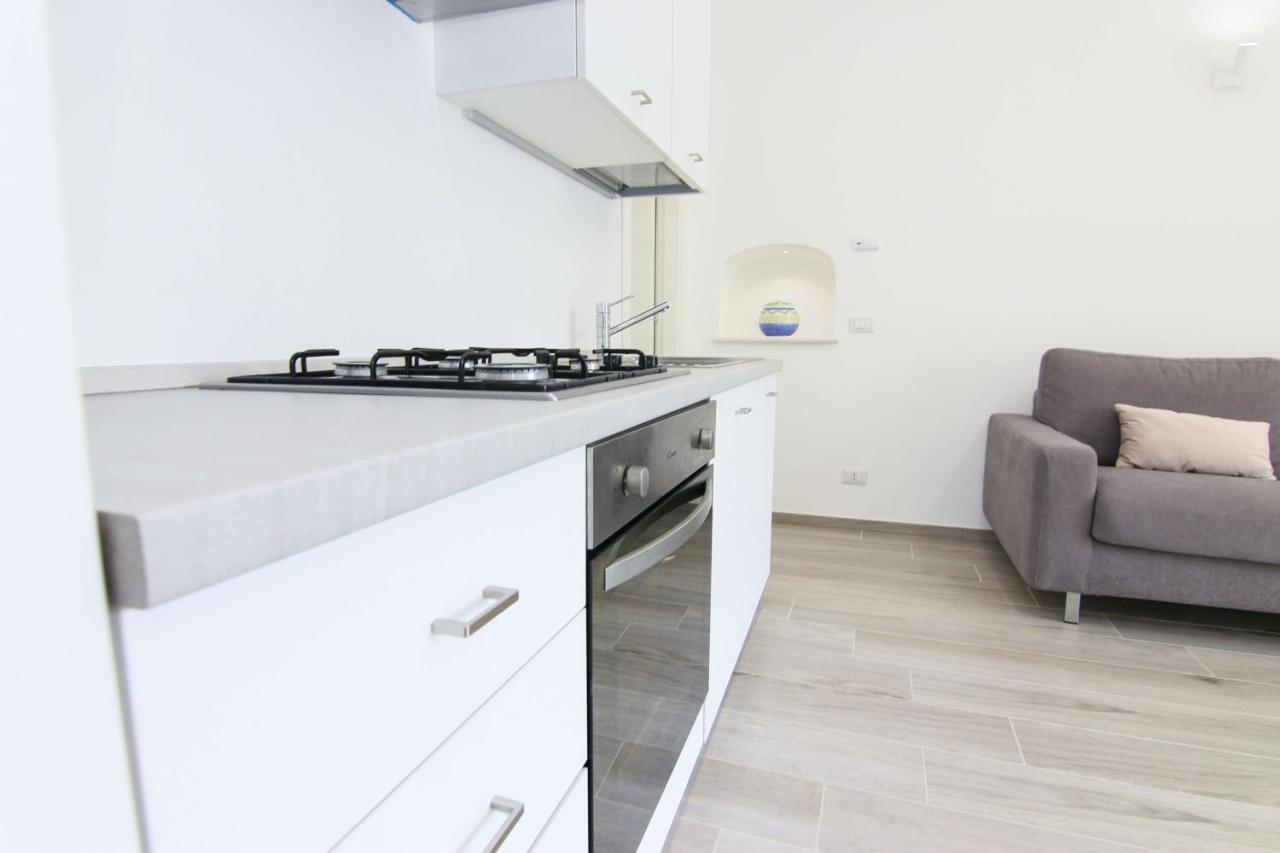 Four White Apartments Аджерола Экстерьер фото